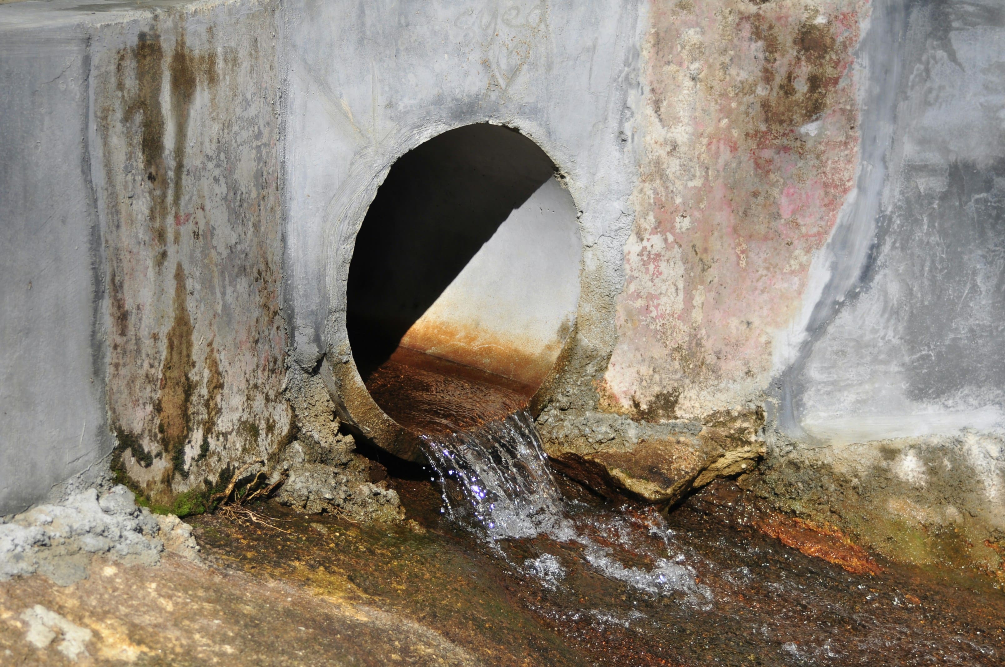 Drain specialist working on a drain