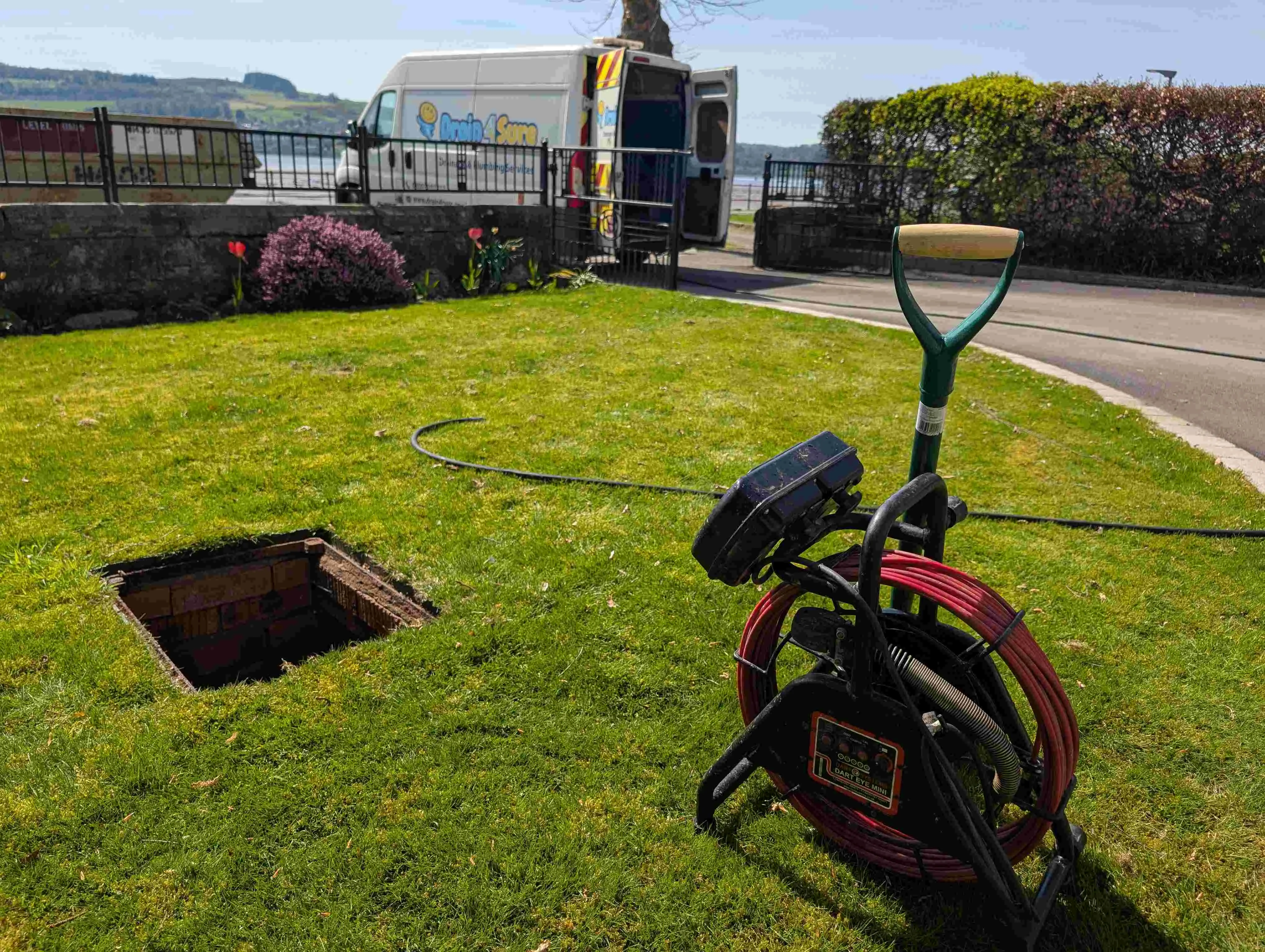 Drain specialist working on a drain