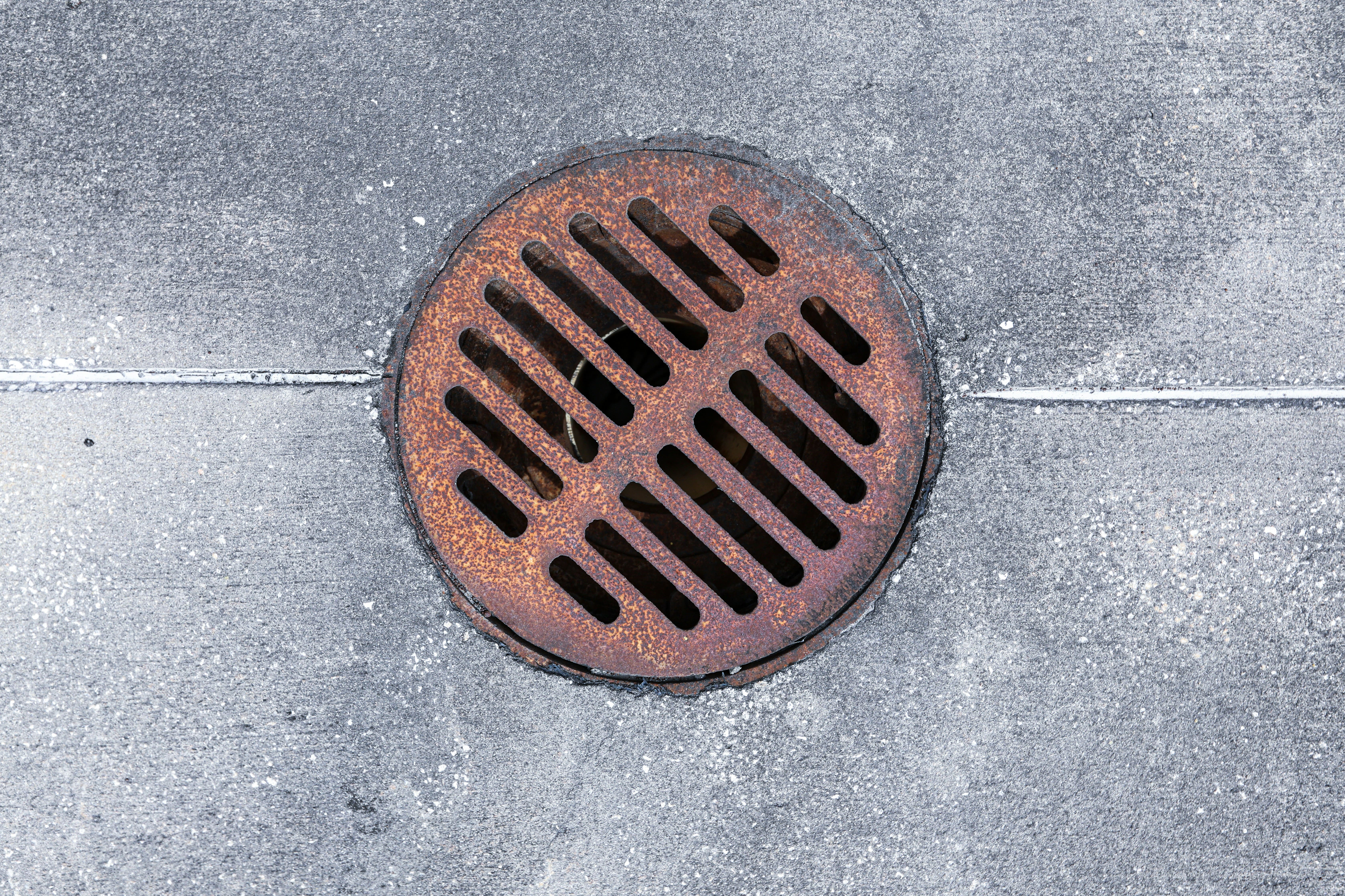 Drain specialist working on a drain